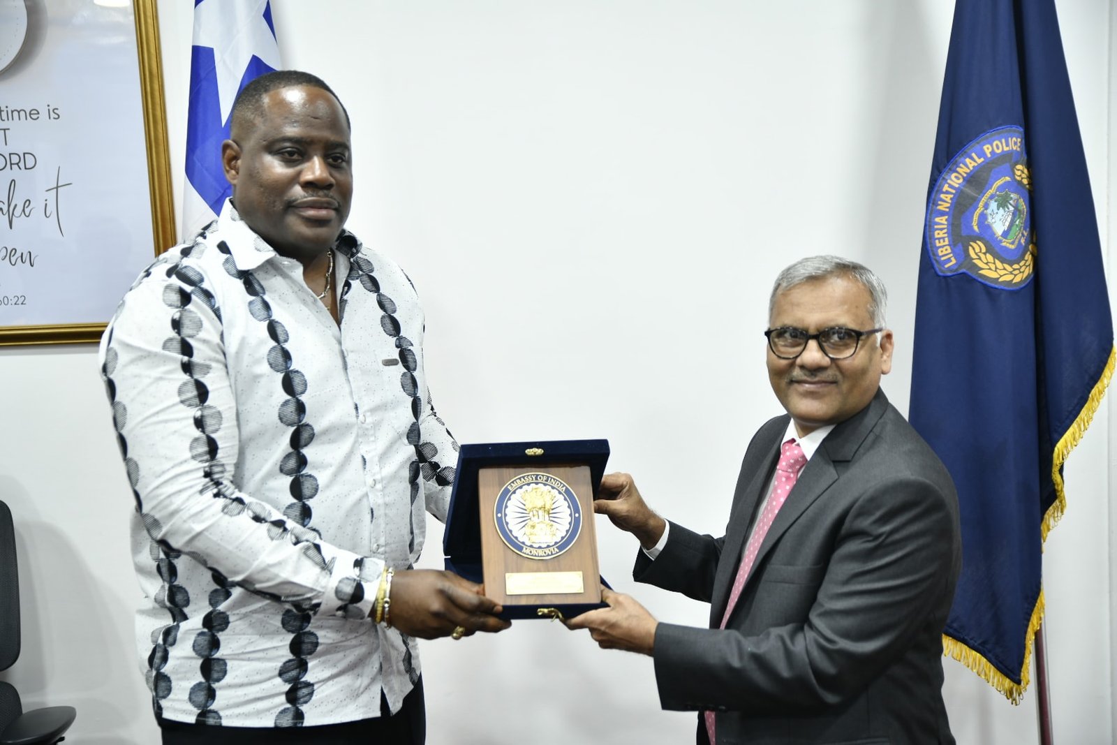 Police IG Gregory O. W. Coleman (left) with Indian Ambassador to Liberia Manoj Bihari Verma