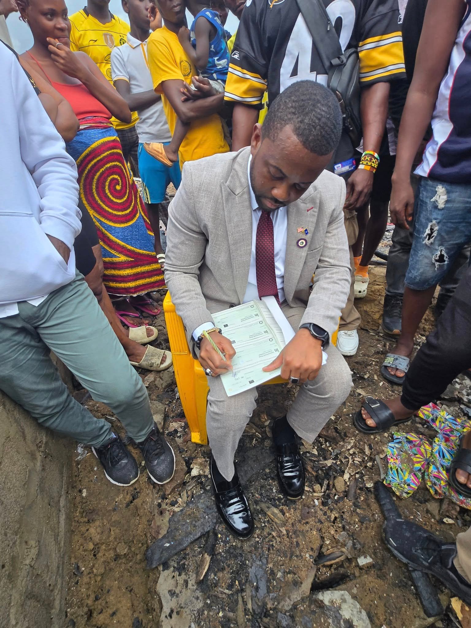 Rep. Toles with Plumkor fire victims